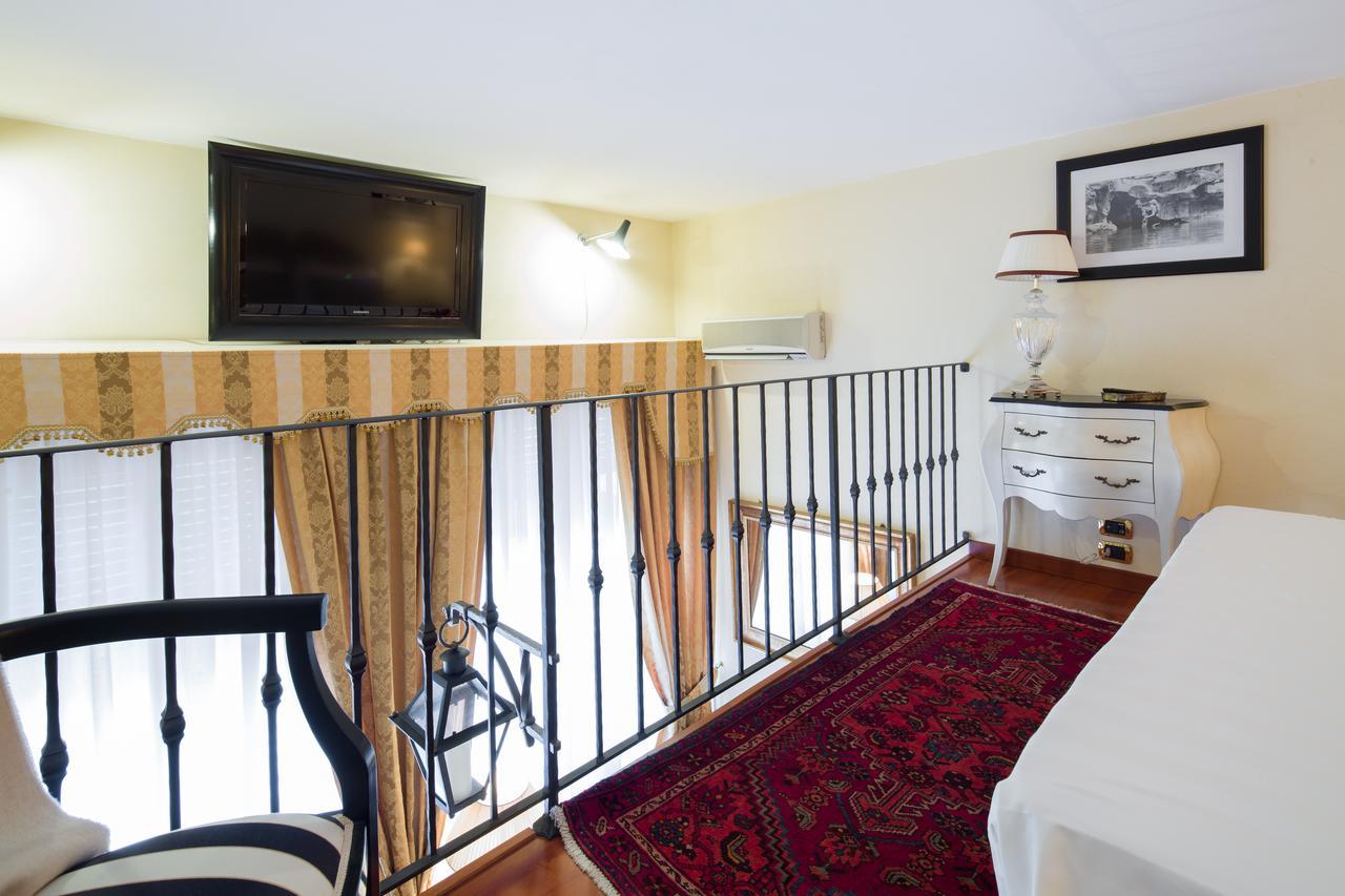 Old Tower Ponte Vecchio Suite Флоренция Номер фото
